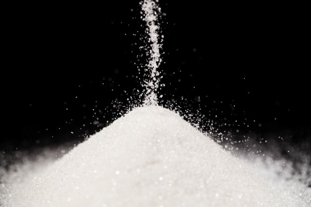 sugar-lies-black-background_1304-3468